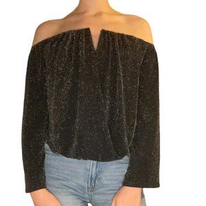 Off-the-shoulder sparkly black v-neck top
